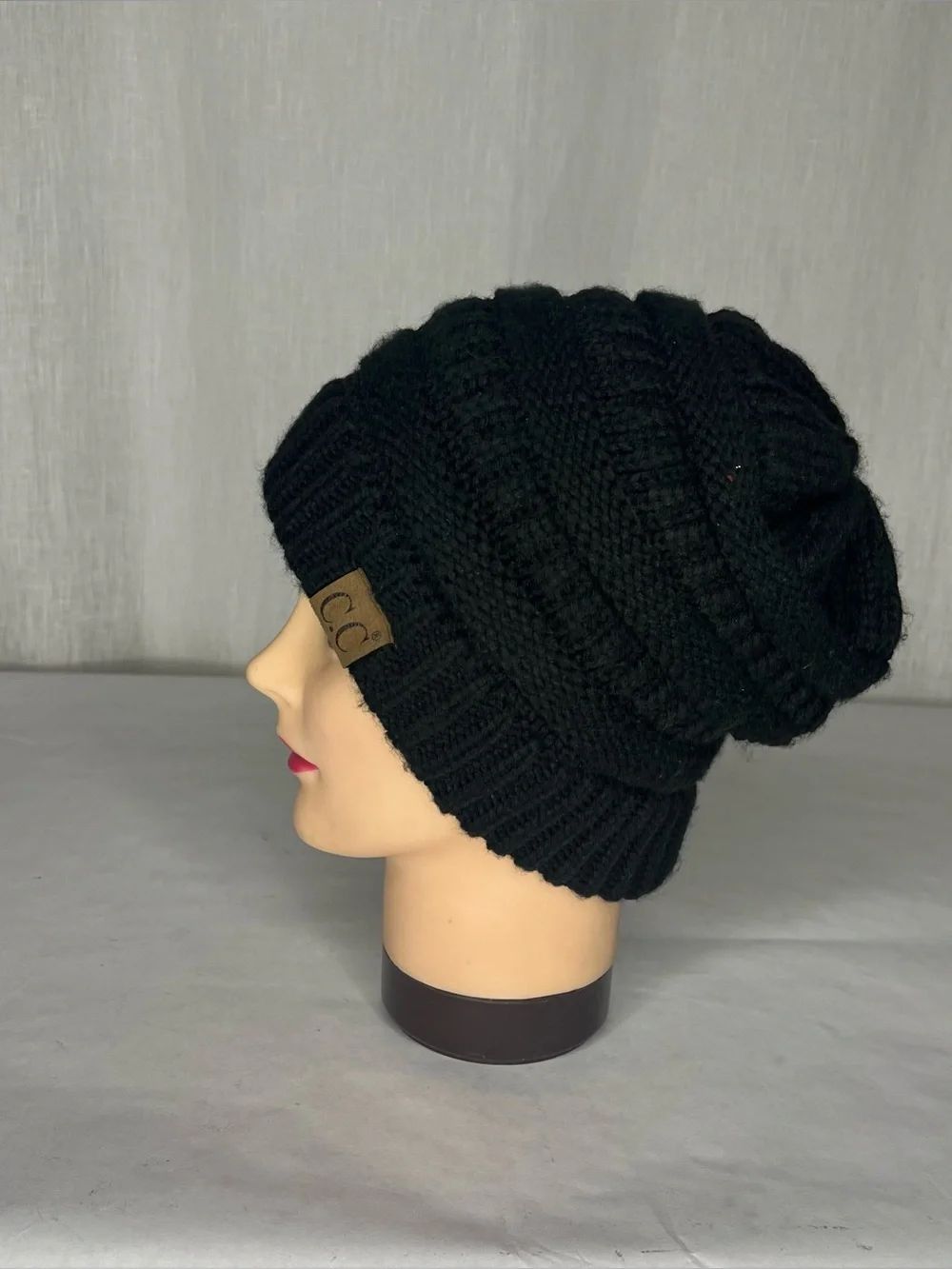 Navy beanie with a bit of rainbow!